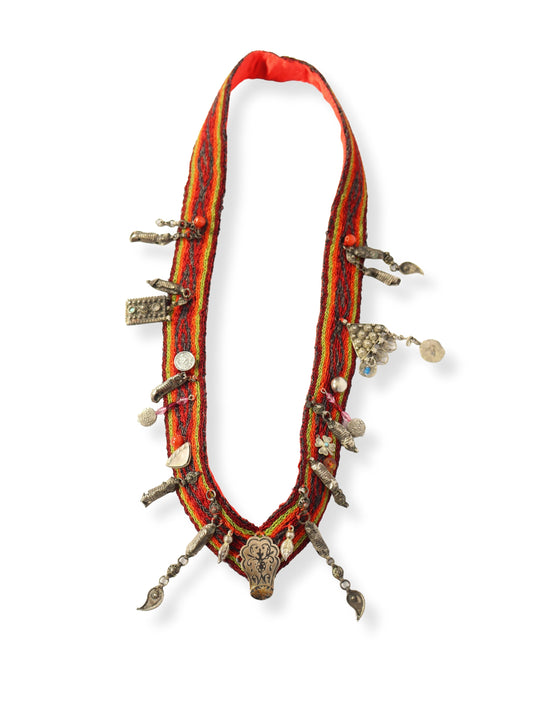 Juniper – Rhythmic Necklace with Fabric and Silver Motif Detail