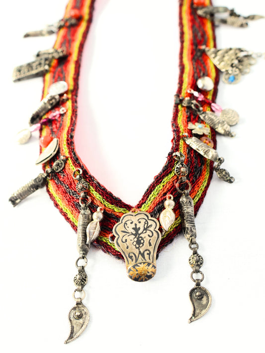 Juniper – Rhythmic Necklace with Fabric and Silver Motif Detail