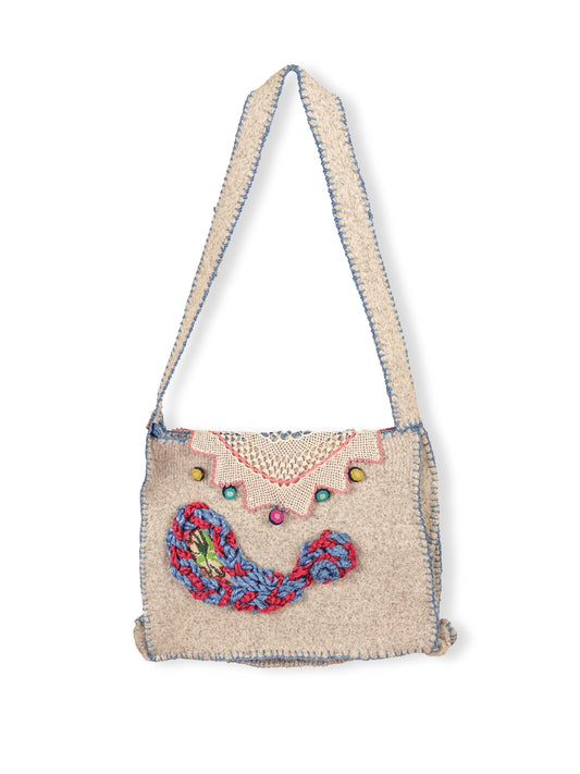 Shura – Colorful Traces on a Knitted Ground Bag
